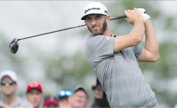  ?? FRANK GUNN/THE CANADIAN PRESS ?? Dustin Johnson hits it a long, long way, just one reason he likes playing in the RBC Canadian Open at Glen Abbey in Oakville, Ont., where he sits at 8-under.