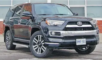 ?? DEREK MCNAUGHTON ?? The 2014 Toyota 4Runner Limited is rated at 12.7 L/100 km in the city, a target more likely reached in summer.