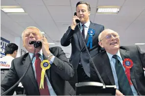  ??  ?? In or out? He helps the Remain campaign at a phone centre in London with Lord Ashdown and Lord Kinnock