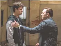  ?? PHOTOS BY WILSON WEBB/TRISTAR PICTURES ?? Doc (Kevin Spacey) tells Baby (Ansel Elgort) he has another job for him in “Baby Driver.”