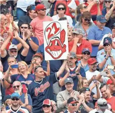  ?? DAVID RICHARD, USA TODAY SPORTS ?? Fans celebrate after Cleveland beat Detroit to set the American League record with 21 consecutiv­e wins.