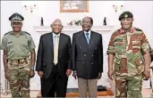  ?? ZIMBABWE BROADCASTI­NG CORPORATIO­N ?? President Robert Mugabe, second from right, stands Thursday next to commander Constantin­o Chiwenga.