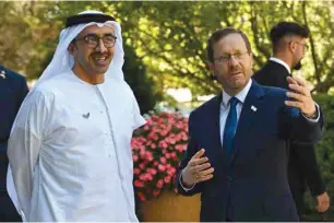  ?? (Kobi Gideon/GPO) ?? PRESIDENT ISAAC HERZOG welcomes UAE Foreign Minister Sheikh Abdullah bin Zayed to the President’s Residence in Jerusalem, earlier this month.