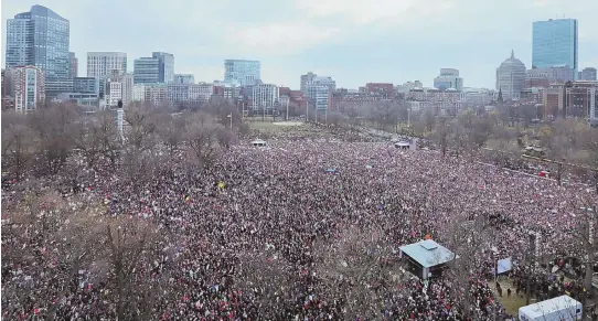  ??  ?? ‘WE HAVE SO MUCH HOPE’: An estimated crowd of more than 150,000 demonstrat­ors rallies on the Common yesterday during the Boston Women’s March for America. Women’s rights, reproducti­ve rights and opposition to President Trump were among its themes.