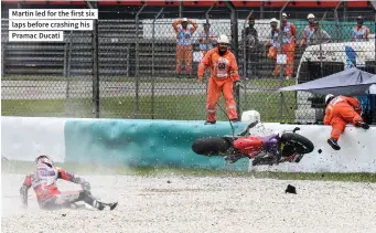  ?? ?? Martin led for the first six laps before crashing his Pramac Ducati