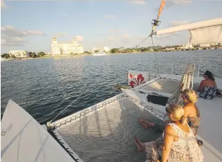  ?? PHOTOS: JIM BYERS/POSTMEDIA NEWS ?? A catamaran cruise of the intracoast­al waterway is a great way to see the sights in and around Palm Beach and West Palm Beach, Fla.