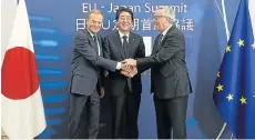  ?? Picture: FLICKR/ EU COUNCIL ?? NEW DEAL: European Council President Donald Tusk, left, Japanese Prime Minister Shinzo Abe, centre, and European Commission President Jean-Claude Juncker at the EU-Japan Summit in 2017