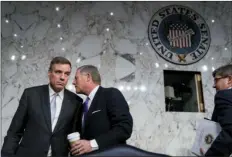  ?? AP PHOTO/ANDREW HARNIK ?? In this Feb. 13 file photo, Vice Chairman Mark Warner, D-Va., (left) and Chairman Richard Burr, R-N.C., speak following a Senate Select Committee on Intelligen­ce hearing on worldwide threats, in Washington. With the 2018 primary season already...