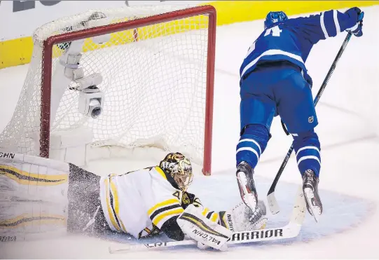  ?? PETER J THOMPSON ?? Toronto’s Auston Matthews goes airborne as he attempts to score on Boston Bruins goalie Tukka Rask in third-period action during Game 6 in Toronto.