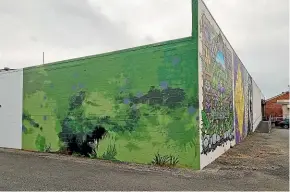  ?? JIMMY ELLINGHAM/STUFF ?? The Manawatū District Council had this wall, which contained a mural of Murray Ball’s well-known Footrot Flats characters Wal and Dog, painted over after the Ball family said they had not given their permission for the characters’ likenesses to be used.