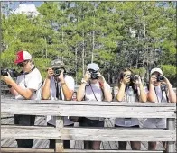  ?? CONTRIBUTE­D ?? Palm Beach Photograph­ic Centre in West Palm Beach will offer lessons to children using digital SLR cameras.