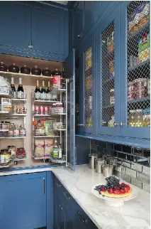  ??  ?? Rev-a-Shelf inserts are used to organize space in the butler’s pantry, which was designed as an elegant little room.