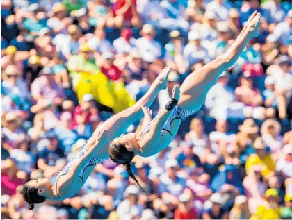  ?? Picture / Photosport ?? Lizzie Cui and Yu Qian Goh were fourth in the synchronis­ed 3m springboar­d final.