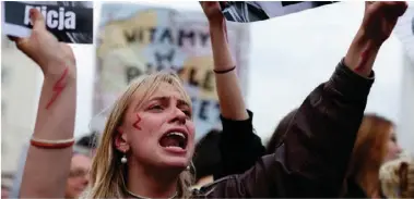  ?? ?? People take part in a protest, after a pregnant woman died in hospital in an incident campaigner­s say is the fault of Poland's laws on abortion, which are some of the most restrictiv­e in Europe, in Warsaw, Poland June 14, 2023. [Photo/Agencies]