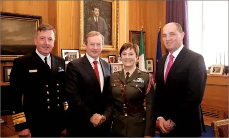  ??  ?? Defence Forces chief of staff Vice-Admiral Mark Mellett, Taoiseach Enda Kenny, Colonel O’Brien and Minister of State Paul Kehoe.
