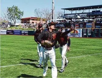  ?? Ash Ponders/Special to The Chronicle ?? Giants minor leaguer Ismael Munguia provided one of the biggest moments of spring training when he homered Friday, coming after his younger brother was killed last week in an accident.