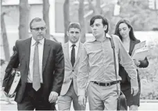  ?? MARK LENNIHAN, AP ?? Martin Shkreli, second from right, arrives at Brooklyn federal court this month. His trial is expected to last four to six weeks.