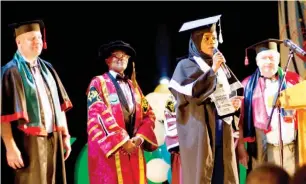  ?? PHOTO: Osun Govt House ?? The best graduating medical student of V.N. Karazin Kharkiv National University, Ukraine, Dr Lateefat Oyeleye Abiola delivers her convocatio­n speech, while the Vice Chancellor of Osun State University (UNIOSUN), Professor Labode Popoola (2nd left),...