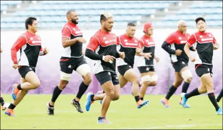  ??  ?? Japan players run during a training session in Tokyo, Japan on Oct 17. Japan play South Africa in a Rugby World Cup quarter-final on Sunday Oct 20. (AP)