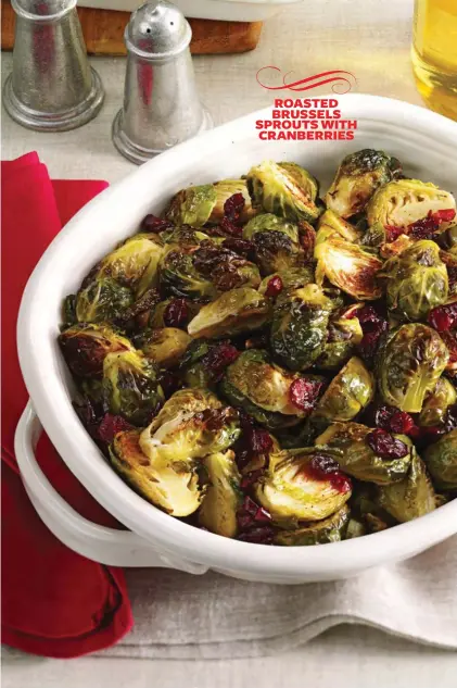  ??  ?? ROASTED BRUSSELS SPROUTS WITH CRANBERRIE­S