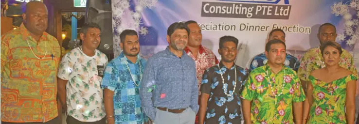  ?? Photo: Waisea Nasokia ?? Attorney-General and Minister for Economy, Aiyaz Sayed-Khaiyum (fourth from left) with some of the team of Promex Consulting PTE Ltd, at Port Denarau, on December 18, 2021.