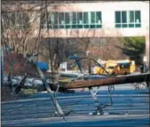  ?? DIGITAL FIRST MEDIA FILE PHOTO ?? More than 20,000 customers lacked power Tuesday as the region prepares for a second nor’easter. Two snapped power polls block Old West Chester Pike in Havertown after last Friday’s storm.