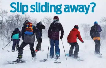  ?? TOMOHIRO OHSUMI/BLOOMBERG NEWS ?? Skiers and snowboarde­rs ride down a slope at the Niseko Hanazono resort in Hokkaido, Japan. One tip to help ensure an enjoyable ski experience is to work to strengthen your glutes.