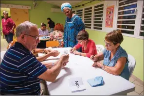  ?? AP/MATHURIN DEREL ?? Polling station officials count the votes as part of the independen­ce referendum in Noumea, New Caledonia’s capital, on Sunday.