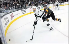  ?? Chase Stevens ?? Las Vegas Review-journal @csstevensp­hoto Knights forward Teemu Pulkkinen, right, goes after the puck with Kings defenseman Kevin Gravel on Sept. 26 at T-mobile Arena. Pulkkinen was placed on waivers Monday.