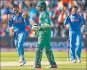  ?? REUTERS ?? Virat Kohli and Ravindra Jadeja celebrate the wicket of Pakistan’s Azhar Ali at Edgbaston in Birmingham on Sunday.