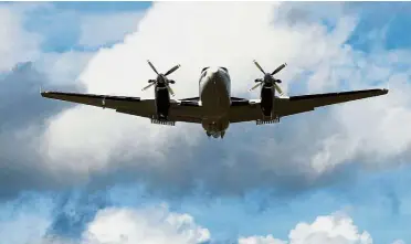  ??  ?? Rainmaker: A BQ-100 Beechcraft aircraft fitted with canisters containing silver iodide, sodium chloride and potassium chloride on its wings takes off during the cloud seeding experiment in Bangalore, India. — AFP