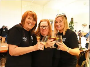  ?? Picture: Wes Hboson. PD091620 ?? CHEERS: Preparing to serve all comers at the Mapplewell Beer Festival are Kay Hilton, Cheryl Cocking and Sally Wordsworth.