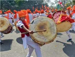  ?? — PTI ?? Members of the Maratha community play drums as they celebrate Shivaji Jayanti in New Delhi on Monday.
