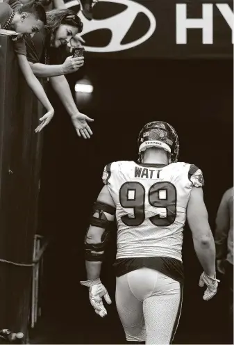  ?? Karen Warren / Staff photograph­er ?? If the Texans want to contend for a playoff spot in 2021 while placating Deshaun Watson, why would they dump future Hall of Famer J.J. Watt without getting anything in return?