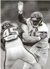  ?? Brett Coomer / Houston Chronicle ?? Rookie linebacker Zach Cunningham, right, led the Texans with seven tackles in Wednesday’s preseason opener against the Panthers.