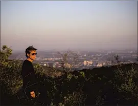  ?? Jay L. Clendenin Los Angeles Times ?? INVESTOR Nicolas Berggruen, shown in 2016 on the 450 acres he’d bought in the Santa Monica Mountains, is the new owner of the Hearst estate in Beverly Hills.