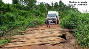  ??  ?? Challengin­g roads in Cambodia