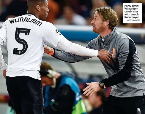  ?? GETTY IMAGES ?? Party time: Wijnaldum celebrates with coach Kornmayer