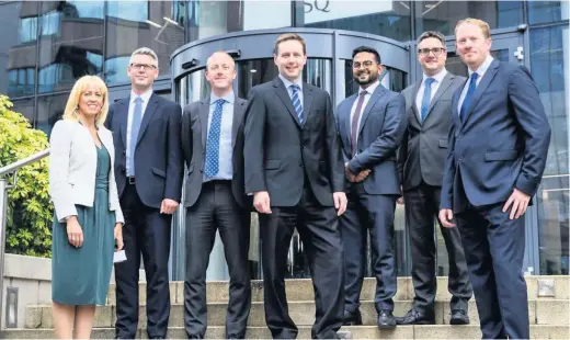  ??  ?? >
Some of the senior team at EY in Birmingham (from left): head of tax Linda Marston Weston, partners Paul Dennis and Mike Grayton, managing partner Simon O’Neill, associate partner Dee Vaghela and partners Dan Hurd and Piers ClintonTar­estad