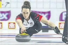  ?? BOB TYMCZYSZYN/POSTMEDIA NETWORK ?? Team Ontario second Joanne Courtney delivers a rock during the Scotties Tournament of Hearts at the Meridian Centre in St. Catharines, Ont. on Wednesday.