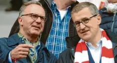  ?? Foto: dpa ?? Zufriedene Mienen: Karl-heinz Rummenigge (l.) und Finanz-chef Jan-christian Dreesen (r.) blicken auf ein wirtschaft­lich erfolgreic­hes Jahr zurück.