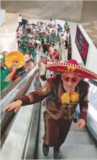  ?? ?? Doha Metro stations witnessed Mexicans singing and dancing while disembarki­ng.