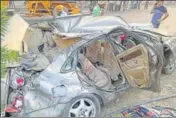  ?? HT PHOTO ?? The damaged Chevrolet Cruze car in which the family was travelling in Khanna on Friday.