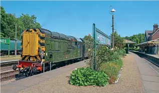  ?? DAVID STAINES ?? Left: The Bluebell Railway had to rely on its only serviceabl­e main line diesel on July 18, when Class 09 No. D4106 (09018) was pressed into front line service and is pictured at Horsted Keynes with the 11.30 East Grinstead-Sheffield Park.
