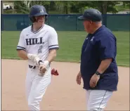  ?? EVAN WHEATON - MEDIANEWS GROUP ?? Hill School’s William Reger, left, takes first base after recording a base hit against Lawrencevi­lle School during a Mid-Atlantic Prep League baseball game at Hill School on April 22.