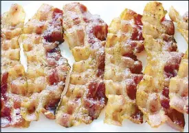  ??  ?? Bacon is bad for you, says a new report from the World Health Organizati­on.