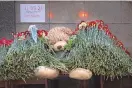  ?? ALEXANDER ZEMLIANICH­ENKO/ASSOCIATED PRESS ?? A teddy bear and flowers honor seven children killed in a school shooting Tuesday in Kazan, Russia. Twenty-one victims were hospitaliz­ed, including six in grave condition.