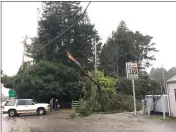  ?? RUTH SCHNEIDER — THE TIMES-STANDARD ?? A tree struck powerlines at the Indianola Market on Myrtle Avenue on Tuesday afternoon. Across the county, there were multiple reports of downed lines as a result of the storm.