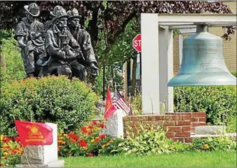  ?? PHOTO BY TONY ADAMIS ?? The Sept. 11 memorial statue at Fireman’s Park in Uptown Kingston, N.Y.