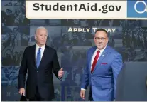  ?? SUSAN WALSH - THE ASSOCIATED PRESS ?? President Joe Biden and Education Secretary Miguel Cardona in Washington on Oct. 17. The Biden administra­tion has stopped processing applicatio­ns for student-loan forgivenes­s.